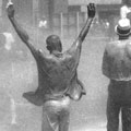 Fire Hoses Directed At Demonstrators
